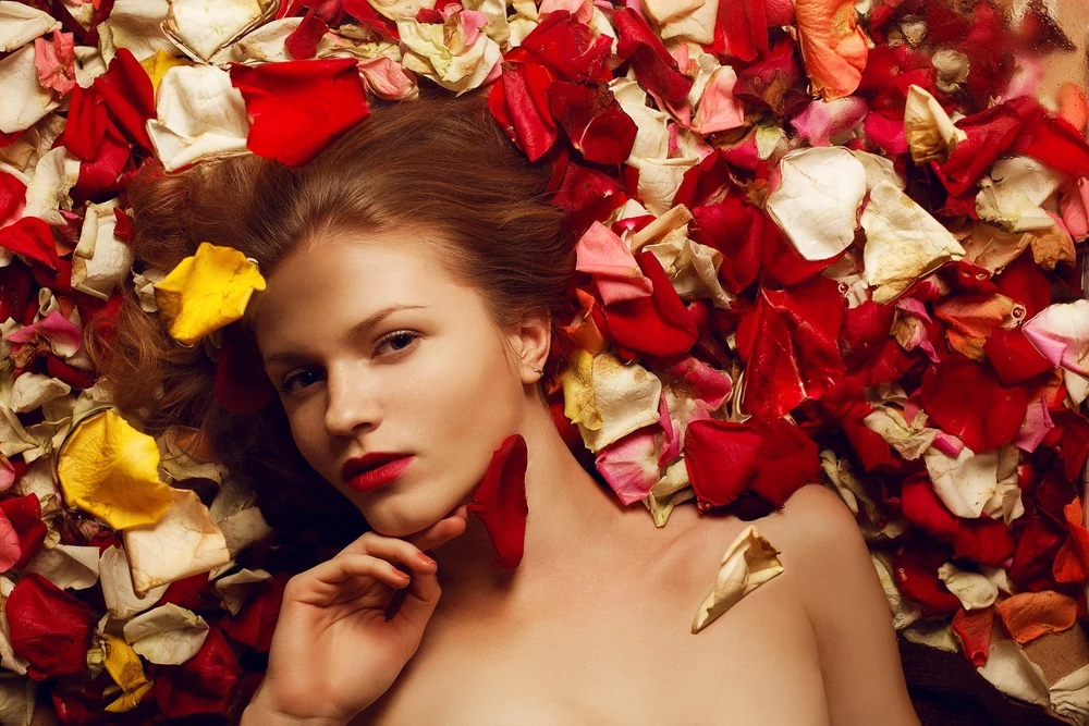 Alti Mora muse in rose petal bath
